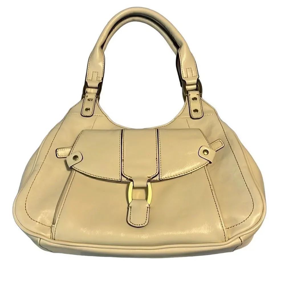 East 5th cream colored handbag.